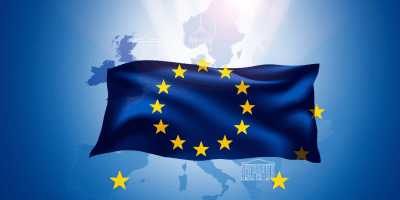 Rappresentazione grafica dell’Unione europea nel 2026, con bandiera UE, istituzioni europee e simboli di cooperazione politica.